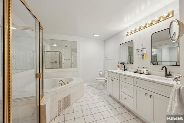 full bathroom with toilet, vanity, separate shower and tub, and tile patterned floors