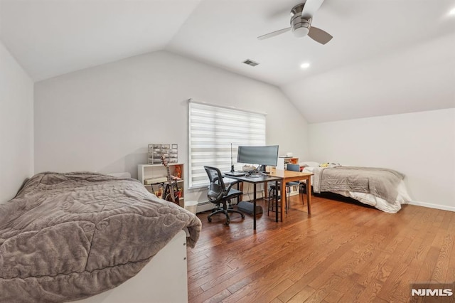 bedroom featuring wood-type flooring, ceiling fan, and vaulted ceiling