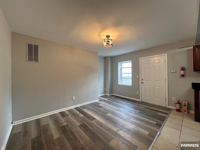 foyer with hardwood / wood-style flooring