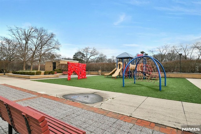 view of playground with a yard