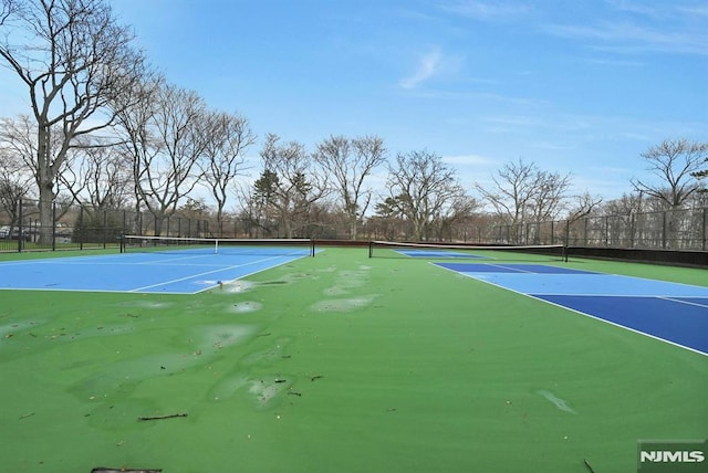 view of tennis court with basketball court