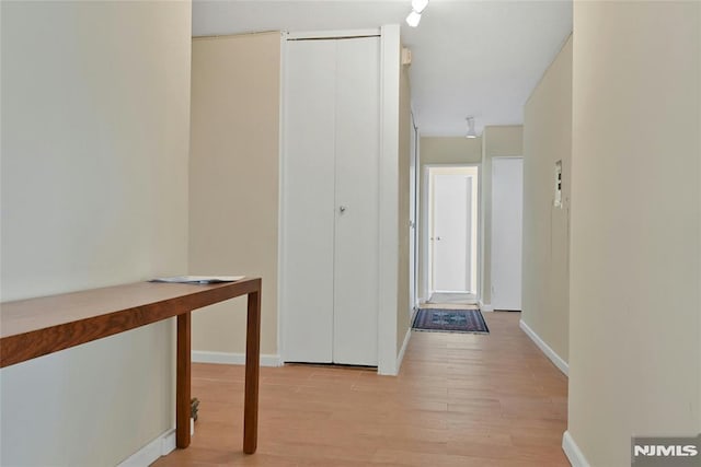 hall featuring light hardwood / wood-style floors