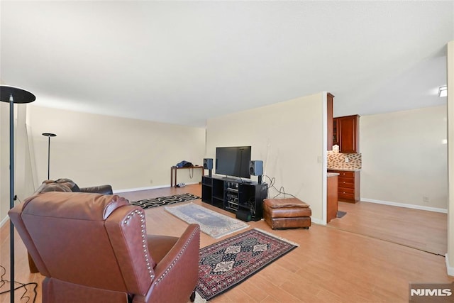 living room with light hardwood / wood-style floors