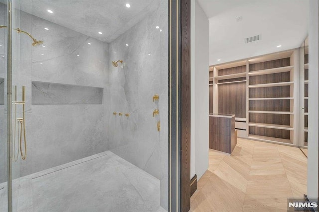 bathroom featuring a shower