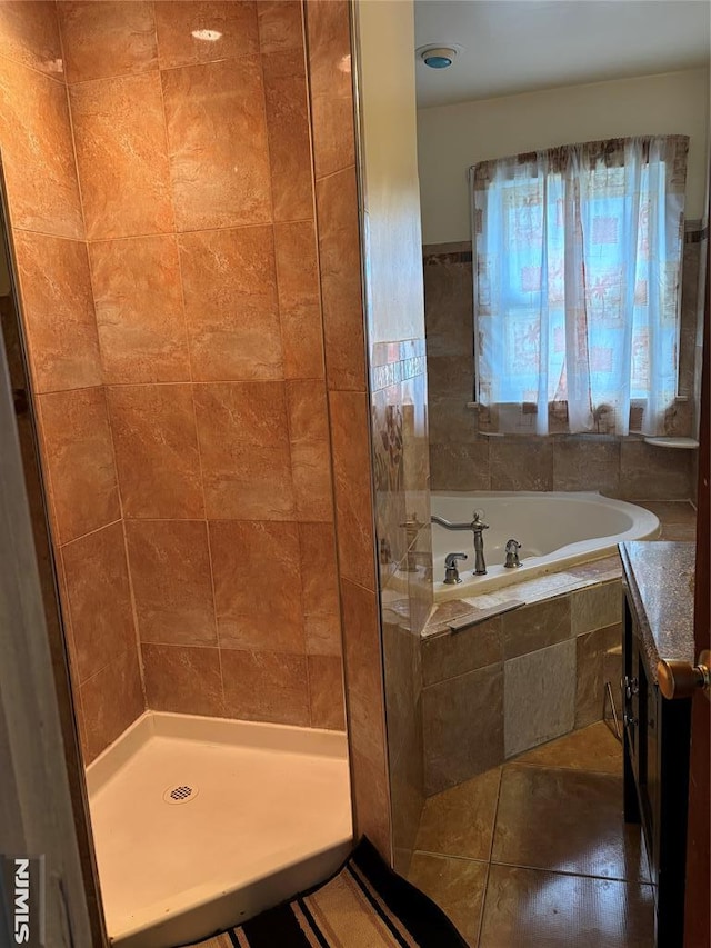 bathroom with tile patterned flooring and plus walk in shower