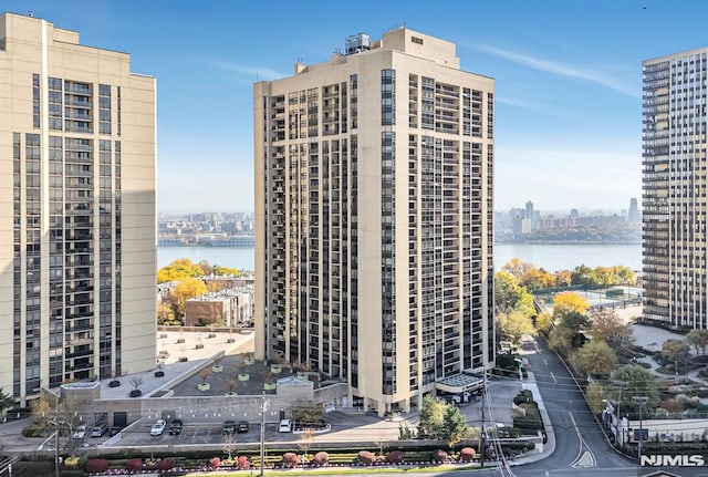 view of building exterior with a water view