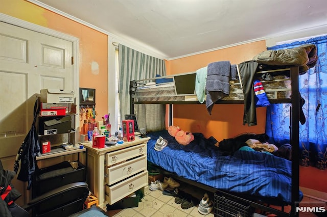 bedroom with crown molding