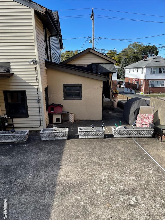 view of home's exterior featuring a patio