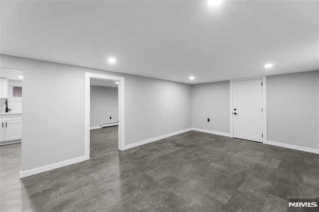 basement with baseboard heating