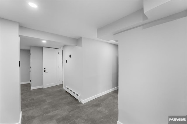 basement with a baseboard radiator