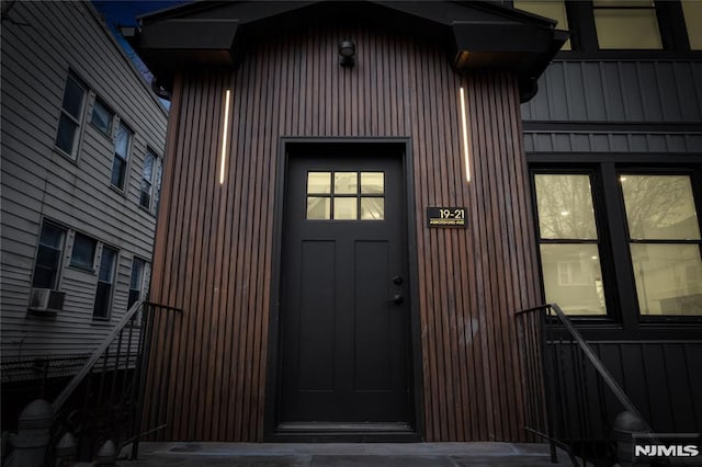 property entrance featuring cooling unit