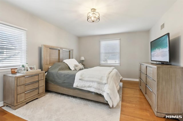 bedroom featuring light hardwood / wood-style flooring