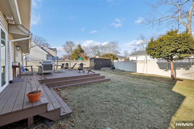 view of yard with a wooden deck