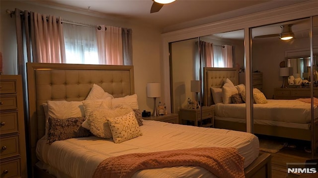 bedroom featuring ceiling fan and ornamental molding