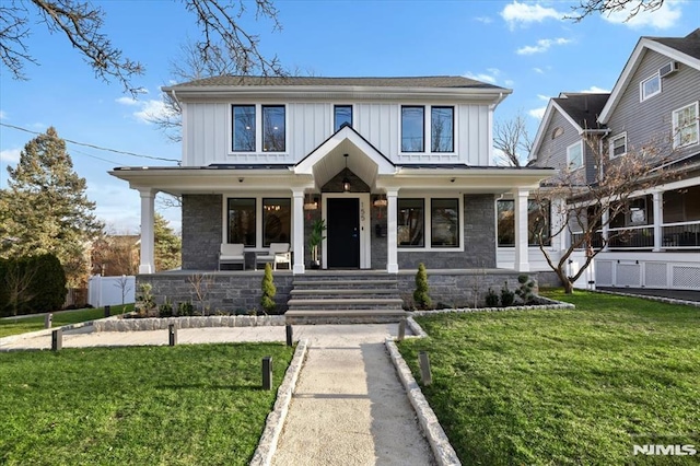 view of front of house featuring a porch and a front yard