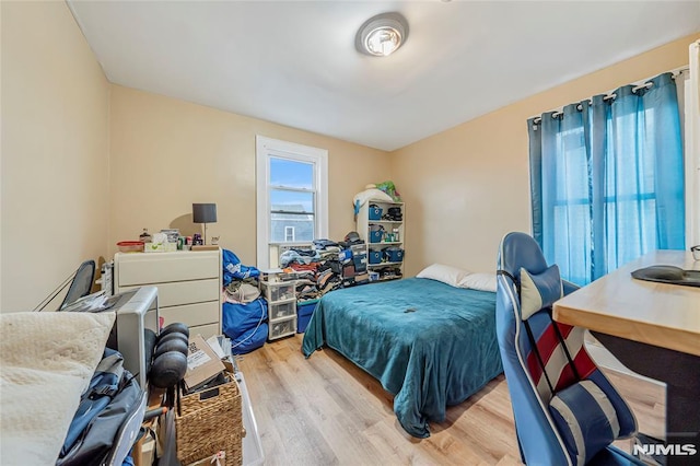 bedroom featuring light hardwood / wood-style floors