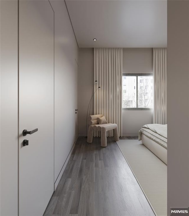 bedroom featuring hardwood / wood-style floors