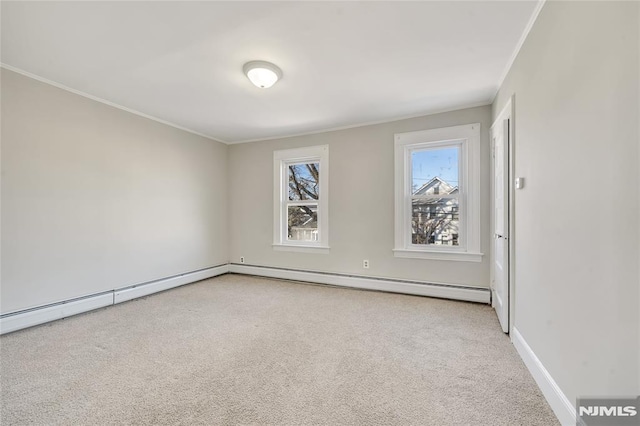 carpeted empty room featuring ornamental molding