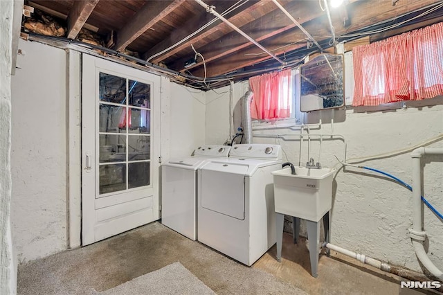 laundry area with washing machine and dryer