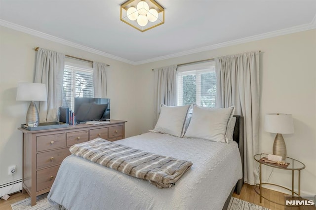 bedroom featuring baseboard heating, light hardwood / wood-style flooring, and ornamental molding