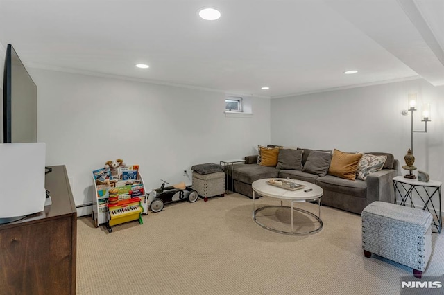 carpeted living room with baseboard heating and ornamental molding