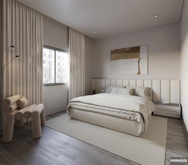 bedroom featuring wood-type flooring