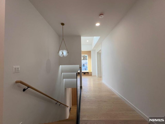 corridor featuring light hardwood / wood-style flooring