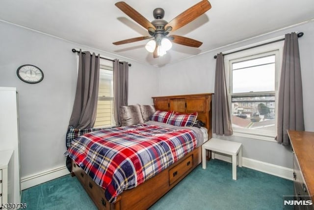 carpeted bedroom featuring ceiling fan and baseboard heating