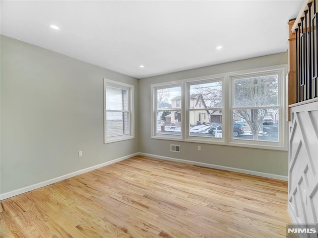 empty room featuring light hardwood / wood-style floors