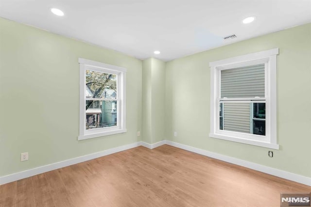 empty room featuring light hardwood / wood-style floors