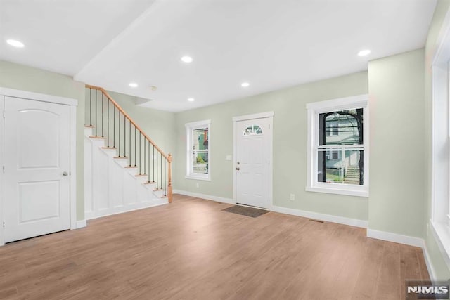 foyer entrance featuring light wood-type flooring