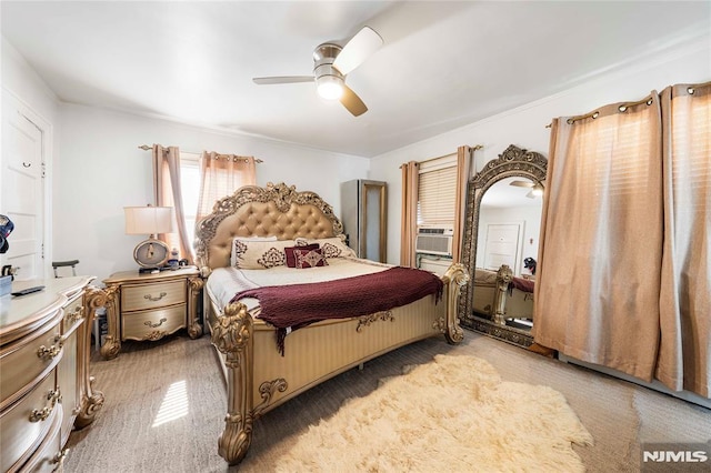 bedroom featuring ceiling fan and cooling unit