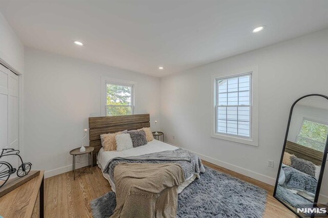 bedroom featuring light hardwood / wood-style floors