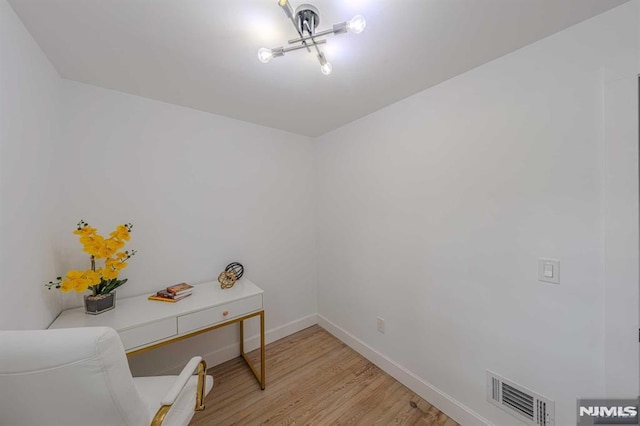 home office featuring light hardwood / wood-style floors