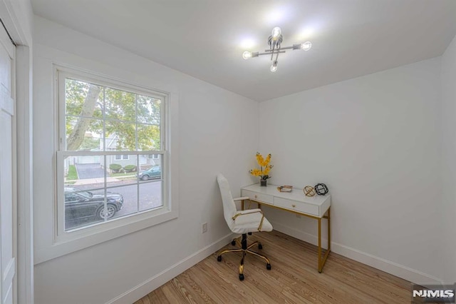 office area with light hardwood / wood-style flooring