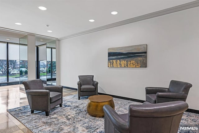 living room with a wall of windows and ornamental molding