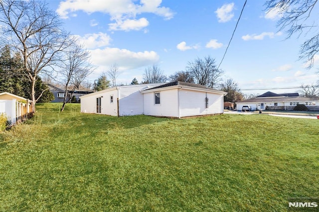 exterior space with a yard