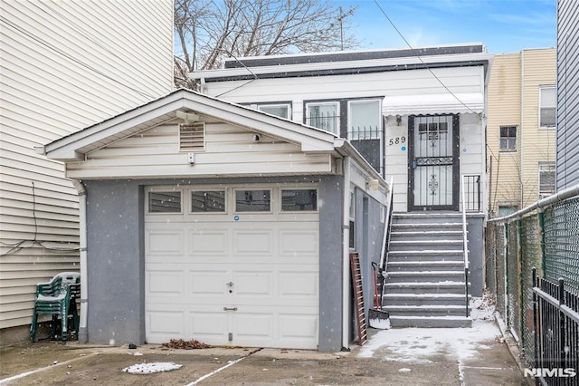 exterior space with a garage