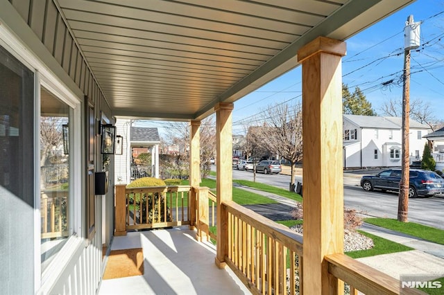 wooden deck with a porch