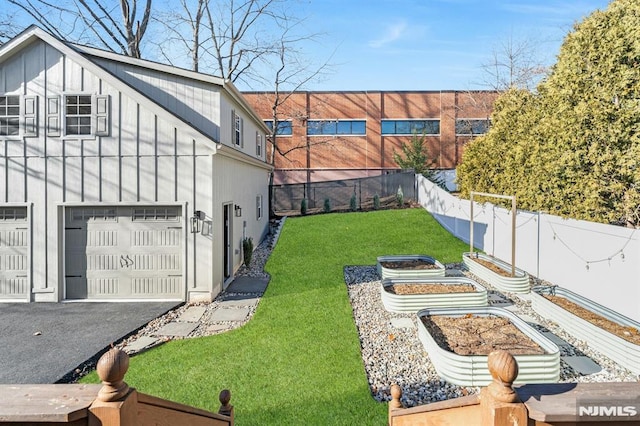 view of yard featuring a garage