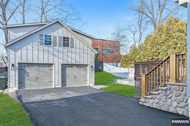 garage with a yard