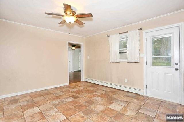 spare room with crown molding and a baseboard radiator