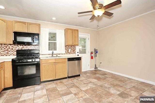 kitchen featuring black appliances, crown molding, sink, and tasteful backsplash