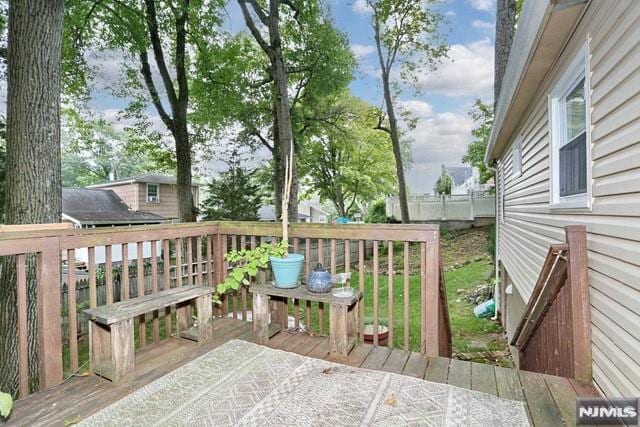 wooden deck featuring a patio