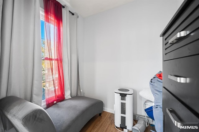 living area with wood-type flooring