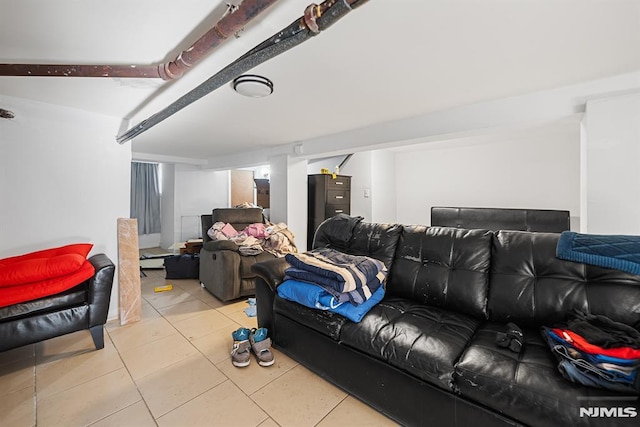 home theater with light tile patterned floors