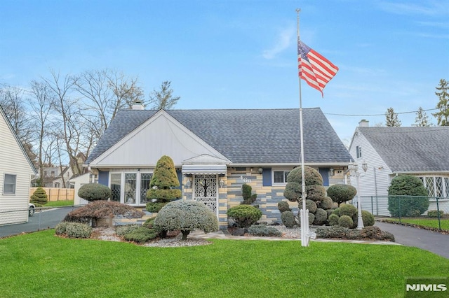 view of front of home with a front yard