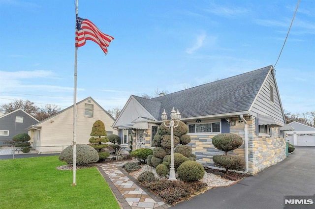 view of front of home with a front yard