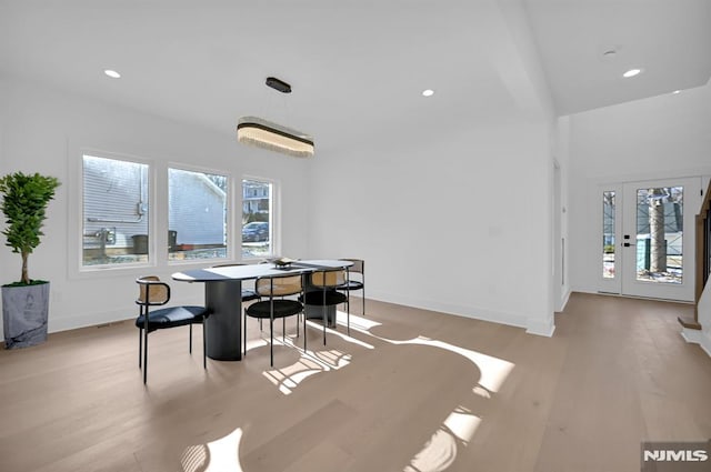 dining space featuring light hardwood / wood-style floors