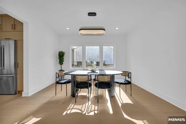 dining room featuring light hardwood / wood-style floors